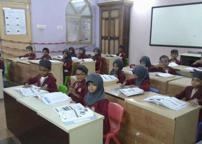 Students learning through interactive digital classrooms at KPILM International School