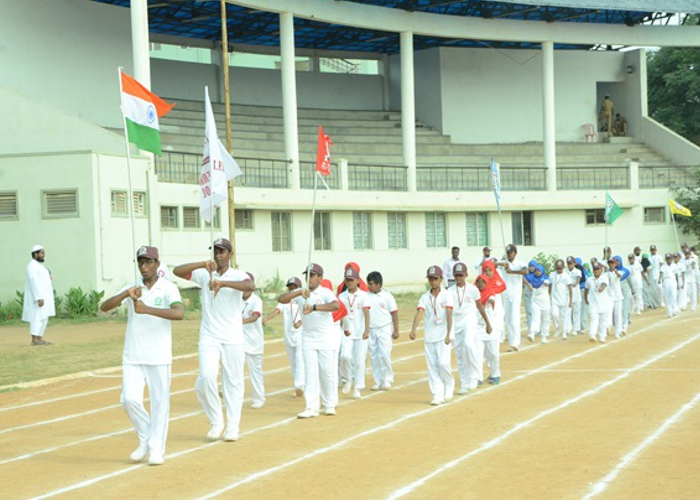 Students playing basketball at KPILM’s multi-sport facility
